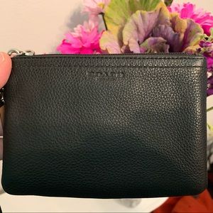 Coach Leather wristlet with embossed logo